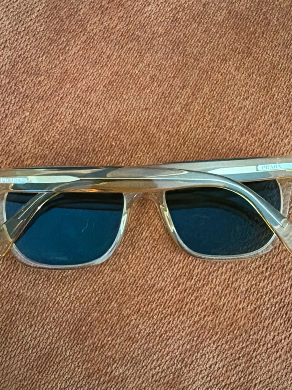 Prada polarized Clear Frame Sunglasses with Dark Lenses